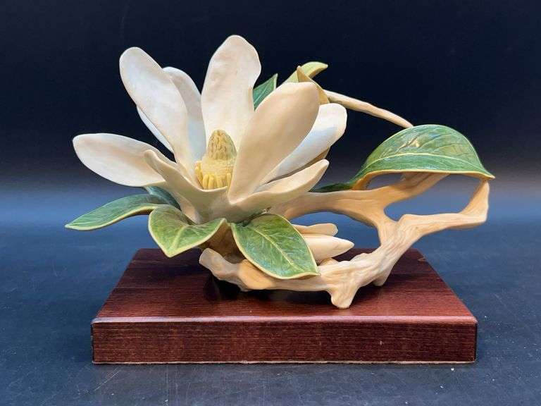 Cybis Magnolia bisque porcelain sculpture on a wooden base……8” long x approx. 6-1/2” tall image