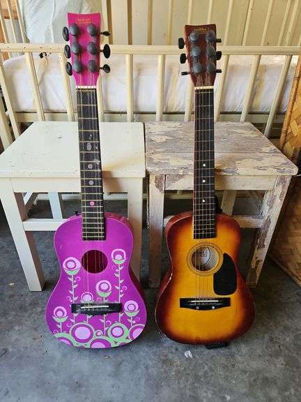 Two(2) FirstAct Discovery Child's Guitars seem to be in good condition... image