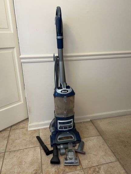 Shark Lift-Away Deluxe Vacuum with attachments…..in working condition with swivel handle image