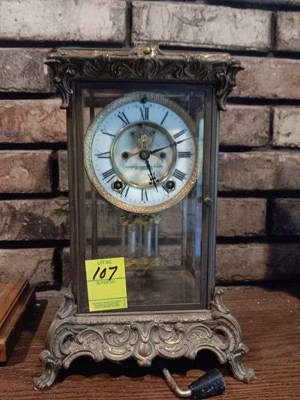Mermaid Jaccard & King brass w glass clock. St Louis, Mo image