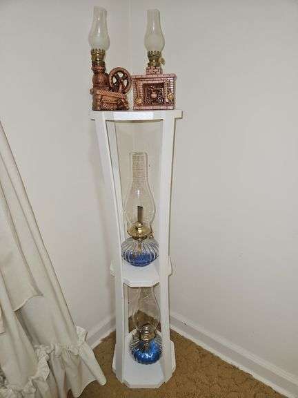 Four(4) vintage oil lamps and 36" tall wooden stand... image