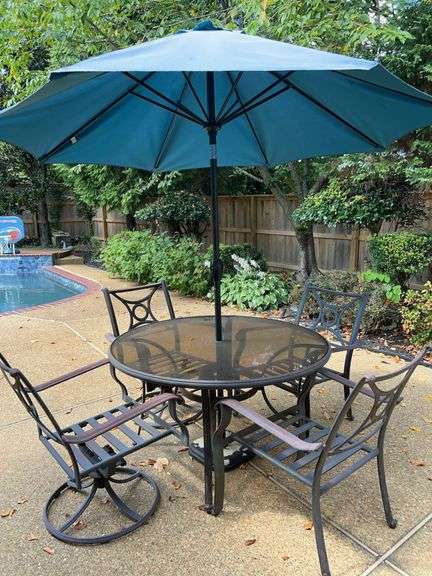 Coleman 6-piece lightweight metal patio set…..includes smoke glass table, 2 swivel springer rockers, 2 arm chairs and umbrella stand and umbrella…..table is 51”D x 29” tall…..springers are 27-1/2 x 21 x 36 tall overall…..arm chairs are 27-1/2 x 21 x 36 tall overall image