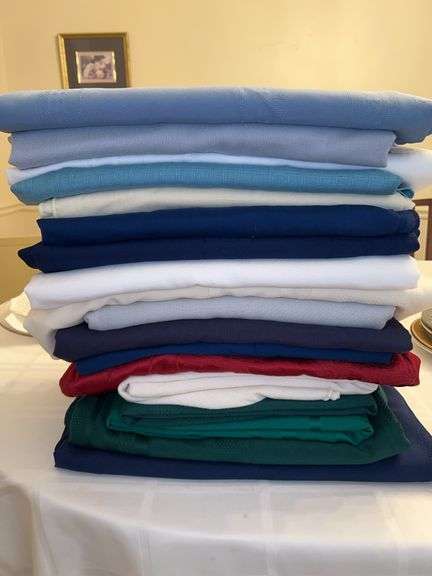 Nice grouping of various size, material and color round tablecloths image