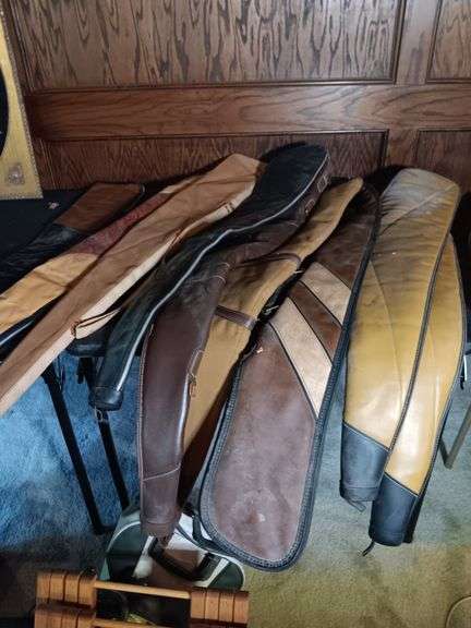Group of shotgun /rifle cases. Outside needs cleaned image