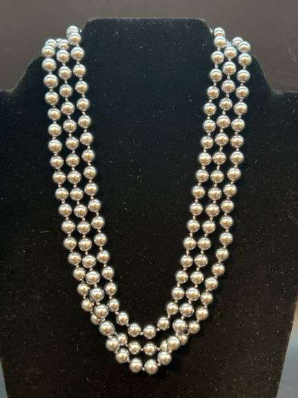 Beautiful triple strand of choker length silver color glass beads image