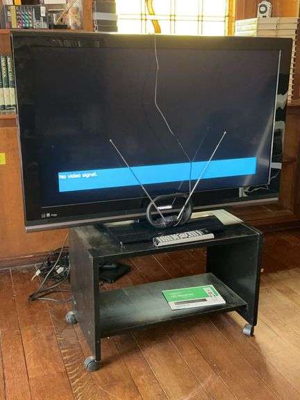 TOSHIBA 42” LCD TV with remote, antenna and stand (model 40RV52R) in working condition image