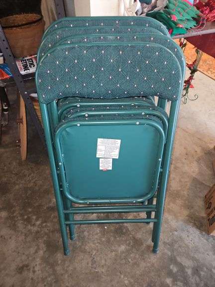 Four(4) Green fabric padded seats & back folding chairs in good condition... image