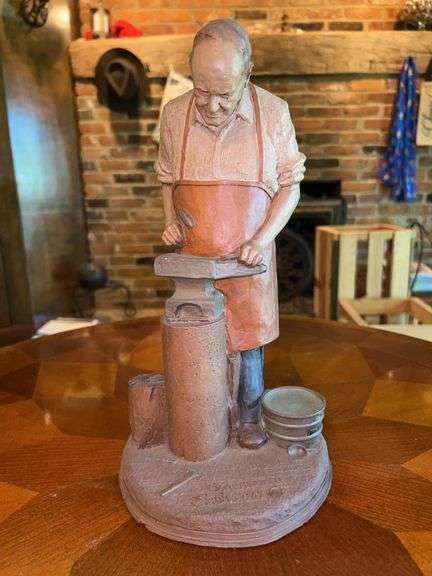 Signed and numbered (#24) Tom Clark 1987 “Blacksmith” Statue….12” tall image