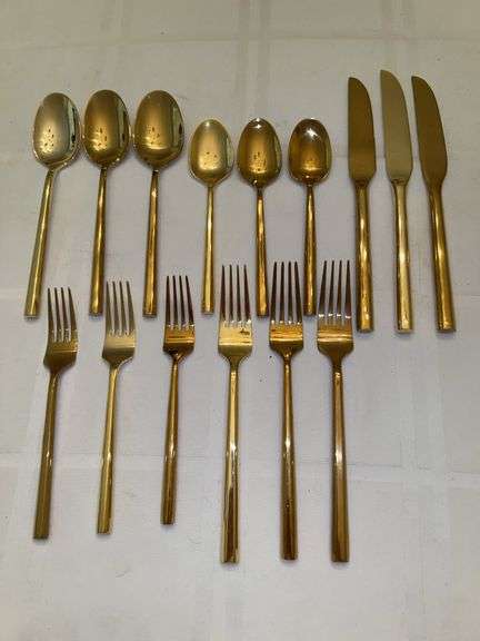 15 pieces of gold-tone stainless flatware image