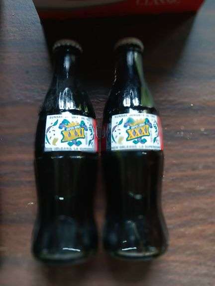 2 Coke superpower bottles...see photos image