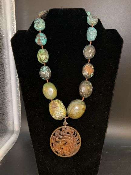 Vintage Tibetan Natural Turquoise necklace with brass-like medallion image