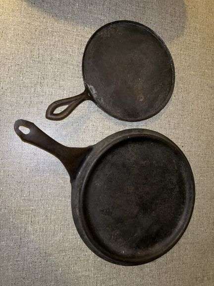 8-3/4” cast iron skillet and an 11” wrought iron skillet image