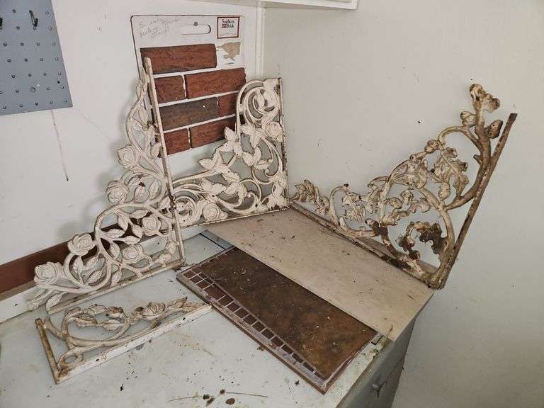 Four(4) pieces of vintage decorative wrought iron corbels in different patterns & sizes... image