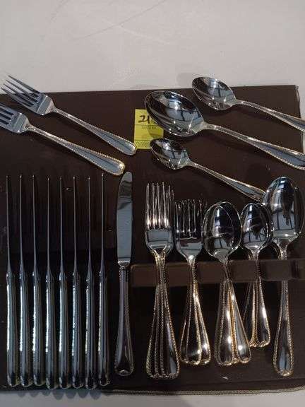 Gotham gold rimmed silverware...set of 9 utensils each plus 4 serving spoons..see photos..49 total image