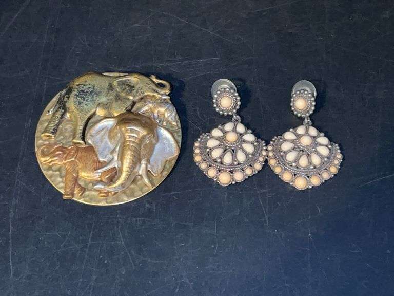 Gold and silver-toned elephant brooch and pair of conch earrings image
