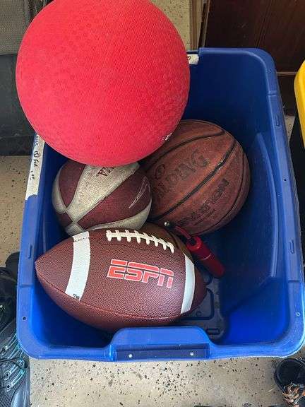 Tote full of sporting equipment…..kick ball, basketballs, footballs, pump (no needle), (3) ball gloves and pair of Roller Derby roller blades (size 9-12) image