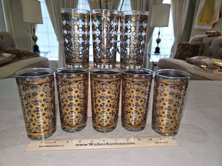 Set of eight(8) vintage 5.5" tall highball glasses by Washington Glass decorated with 22 karat gold over translucent teal enamel in an all-over pattern of quatrefoils in like new vintage condition... image