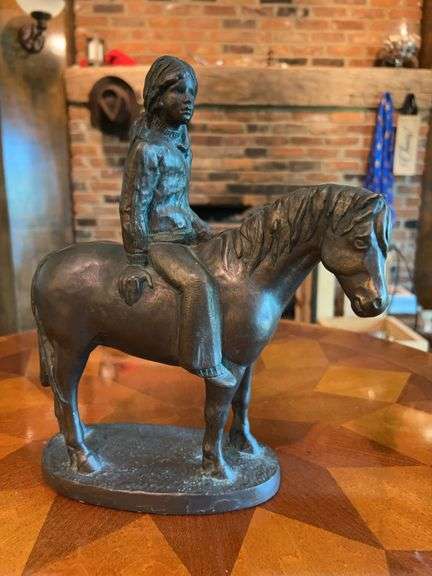 Artist signed reproduction of girl on horse…..IT IS NOT BRONZE…..has more of a resin feel…..9 x 11-1/4….one tiny blemish on mane image