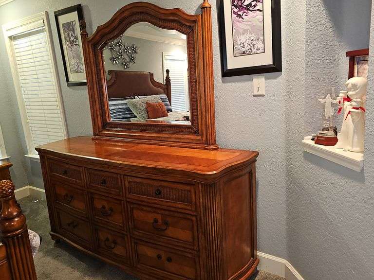 Tommy Bahama triple dresser and mirror. Contents in or on are not included.