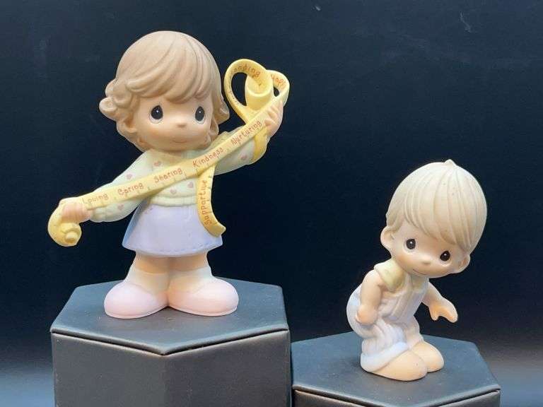 (2) Precious Moments bisque porcelain figurines……”A Mother's Love Is Beyond Measure” and “Baby Boy”……4-1/4 and 3-1/4” tall image