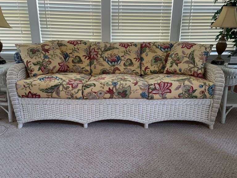 White wicker sofa with cushions……80 x 21 x 31 tall overall image