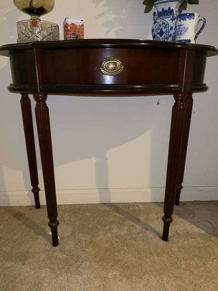 Cherry finish half-moon single drawer table….31-1/2 x 16 x 29 tall image