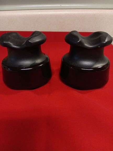 2 vintage brown with black top insulators. image