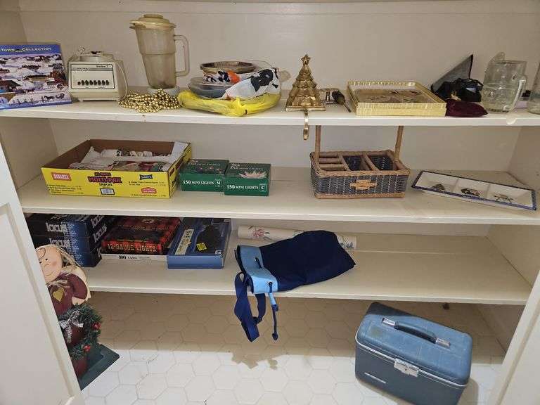 Contents of bottom 3 shelves & floor in upstairs bathroom closet containing Christmas decor & more PLEASE BE SURE TO LOOK AT ALL PICS... image