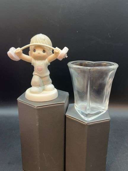2003 Precious Moments “Nothing Is Stringer Than Our Love” bisque porcelain figurine with coordinating heart shaped bud vase…..4-1/2” tall image