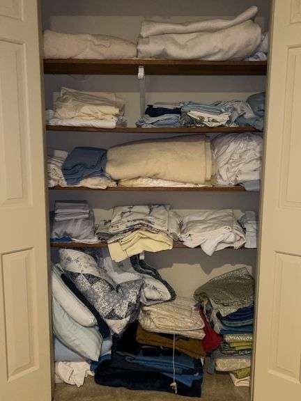 Contents of linen closet…..sizes are unknown and fabric is NC Textile image