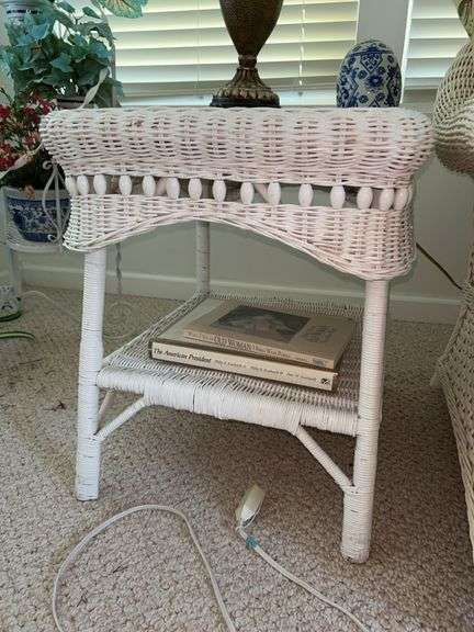 White wicker side table…..22-1/2 x 18 x 22-1/2 tall…..OTHER CONTENTS NOT INCLUDED image
