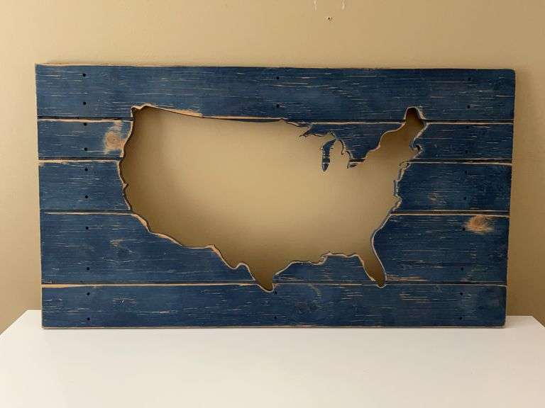 Plywood cutout of United States with blue wash paint…..36 x 20 image