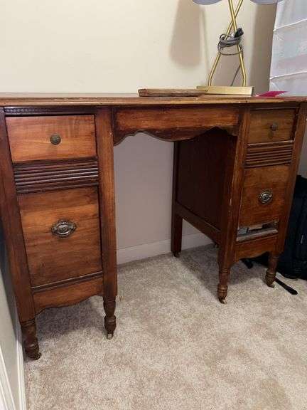 Antique child size desk…..there is a piece to the bottom right drawer that needs put back on…..40 x 16-3/4 x 31 tall…..LAMP AND DRAWER CONTENTS NOT INCLUDED image