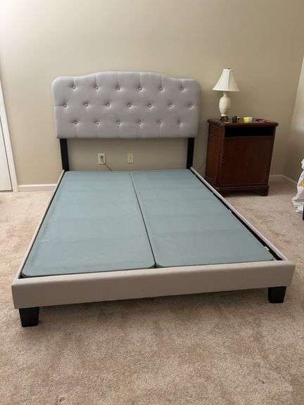 Full size bed frame with padded gray tufted headboard and gray padded side boards…..THIS LOT IS FOR FRAME ONLY AND NO OTHER CONTENTS image