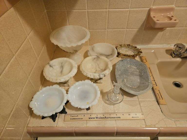 Collection of soap dishes and marble vases... image