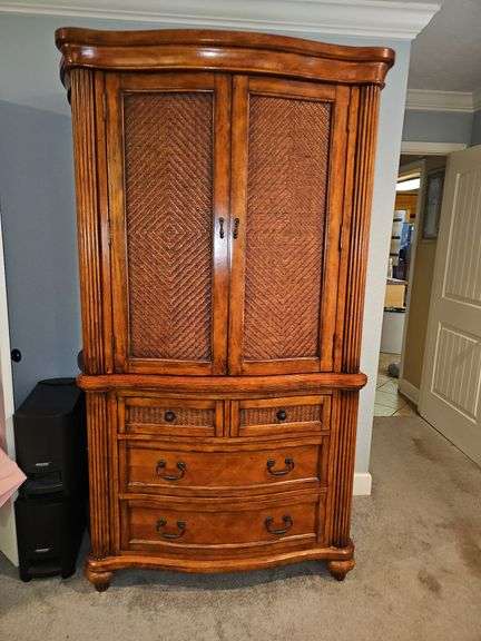 Tommy Bahama armoire. Contents not included.