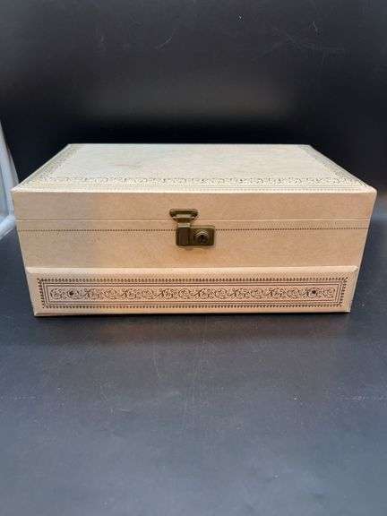 Vintage jewelry box with key image