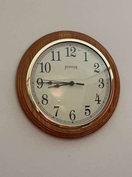 Ingraham 9” Round Wall Clock in Honey Oak Frame….needs battery image