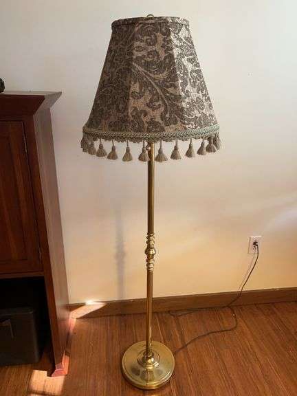 Nice looking gold tone floor lamp with embroidered and tasseled shade…..16-1/4 tall image