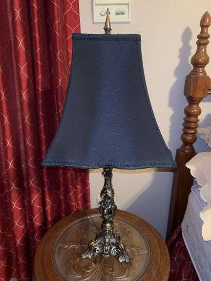 Nicely designed brass base lamp with elegant scalloped edge navy blue shade…..25-1/2” tall image