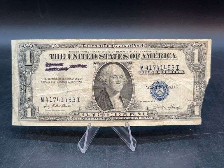 Blue Seal 1935E Series $1 Silver Certificate…..lower corner is missing and writing on front image
