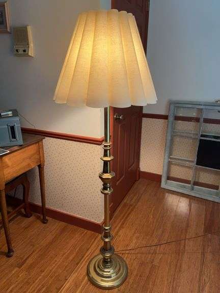 Nice looking brass base floor lamp with melon shade….57-1/2” tall image