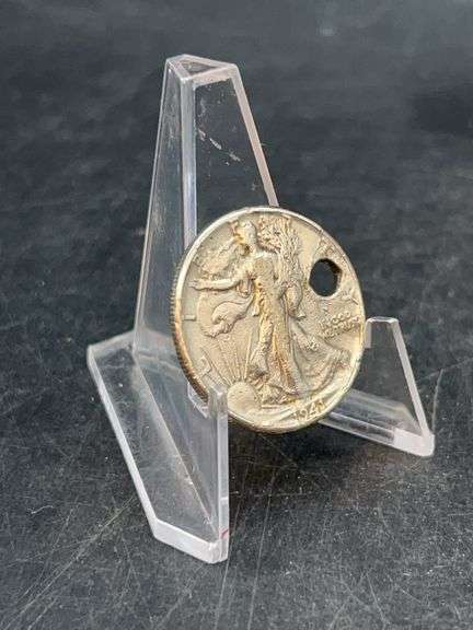 1941 Silver Walking Liberty Half Dollar…..does have a hole punched in it on the right…..12 grams image
