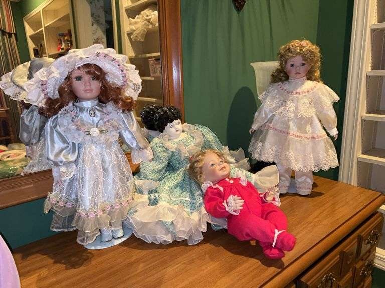 Grouping of (3) vintage porcelain dolls and (1) china head doll….all have soft bodies image