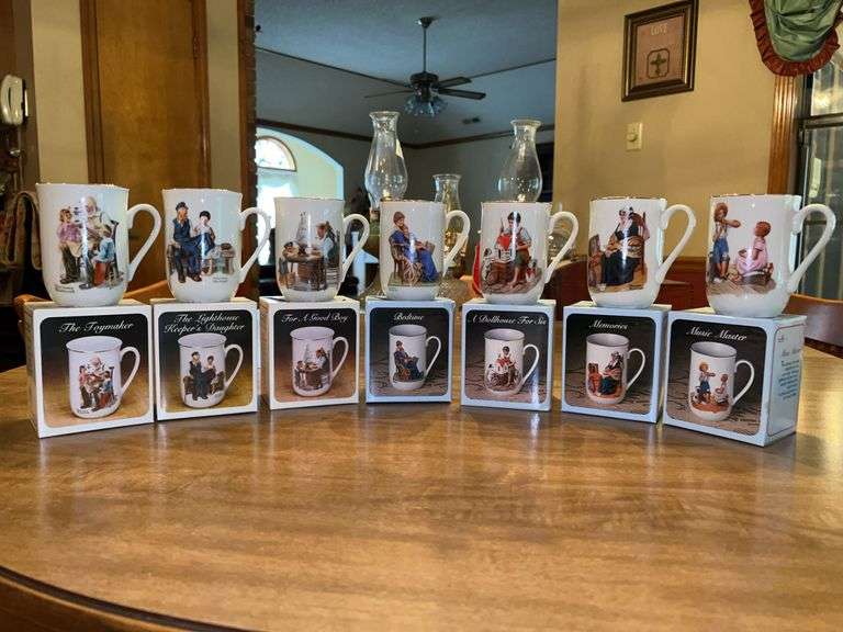 Collection of (7) Norman Rockwell Collectors Mugs in original boxes…..please see all pics for individual cup names image