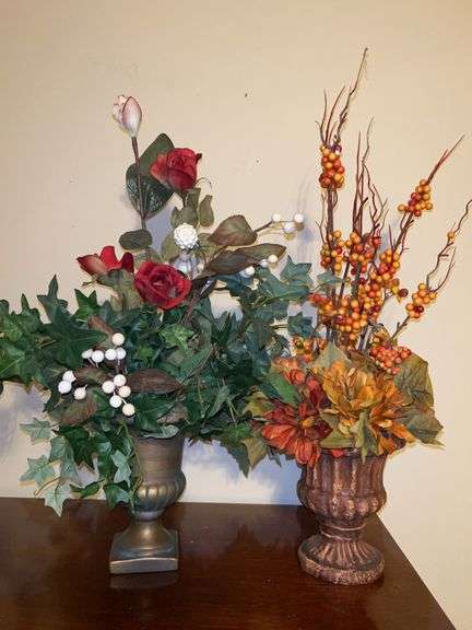(2) composite material urn-style planters with artificial florals…..6 and 6-3/4” tall image