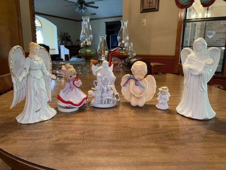 Grouping of ceramic and porcelain angels…..ranging from 3-1/2 to 9-1/2” tall….makers include PartyLite, Enesco, Craven Pottery image