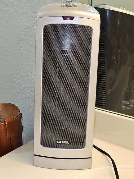 Lasco oscillating heater and fan in one. 16 in tall. Works as it should. Needs cleaned.