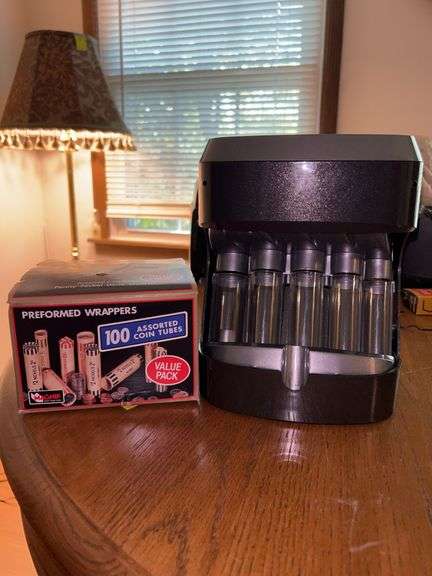 UltraSorter Motorized Coin Sorter and box of Coin tubes (unknown if full box)…..sorter appears to be new image