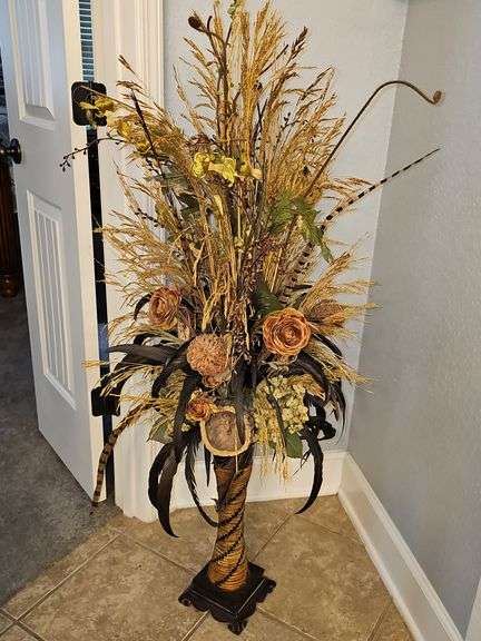 Lovely arrangement in reed-look tall vase. Total height is 52 in. Vase is 19 in.
